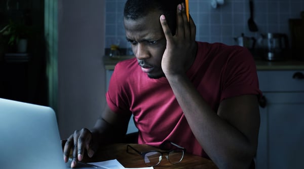 man at laptop - manual reporting